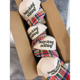 busy doing nothing trucker hat - multi plaid