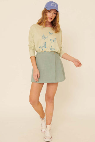 Woven Front Button Wrap Back Pleated Mini Skirt (Sage)