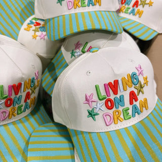 living on a dream trucker hat - blue / green