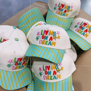 living on a dream trucker hat - blue / green